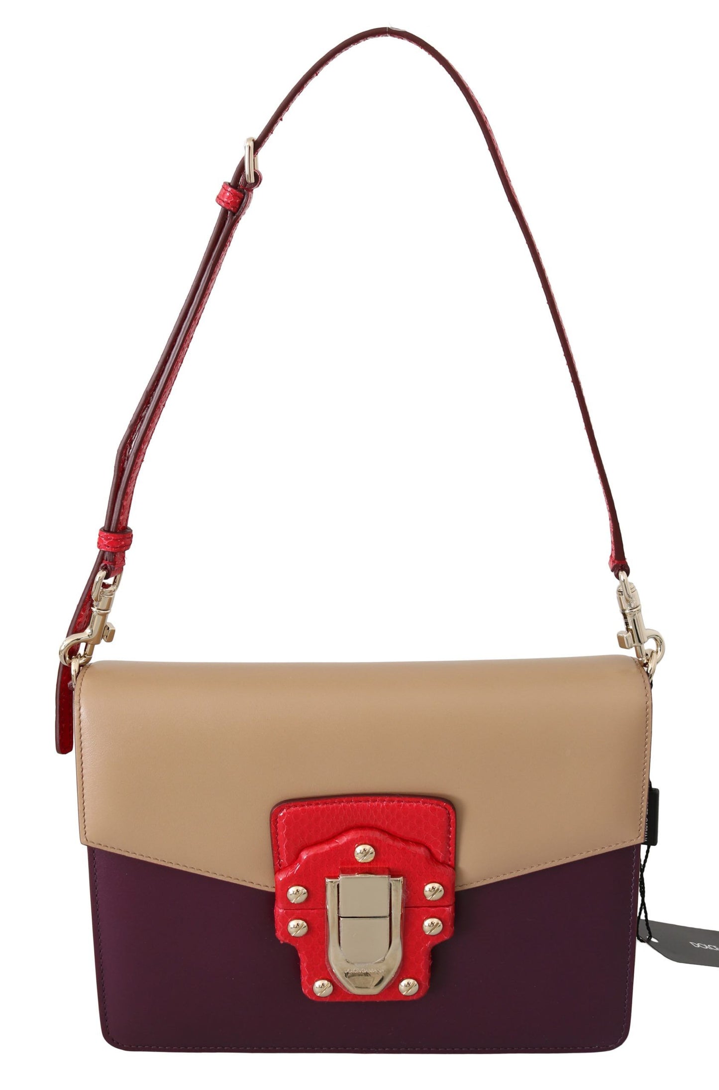 Multicolored handbag with a red strap on a white background