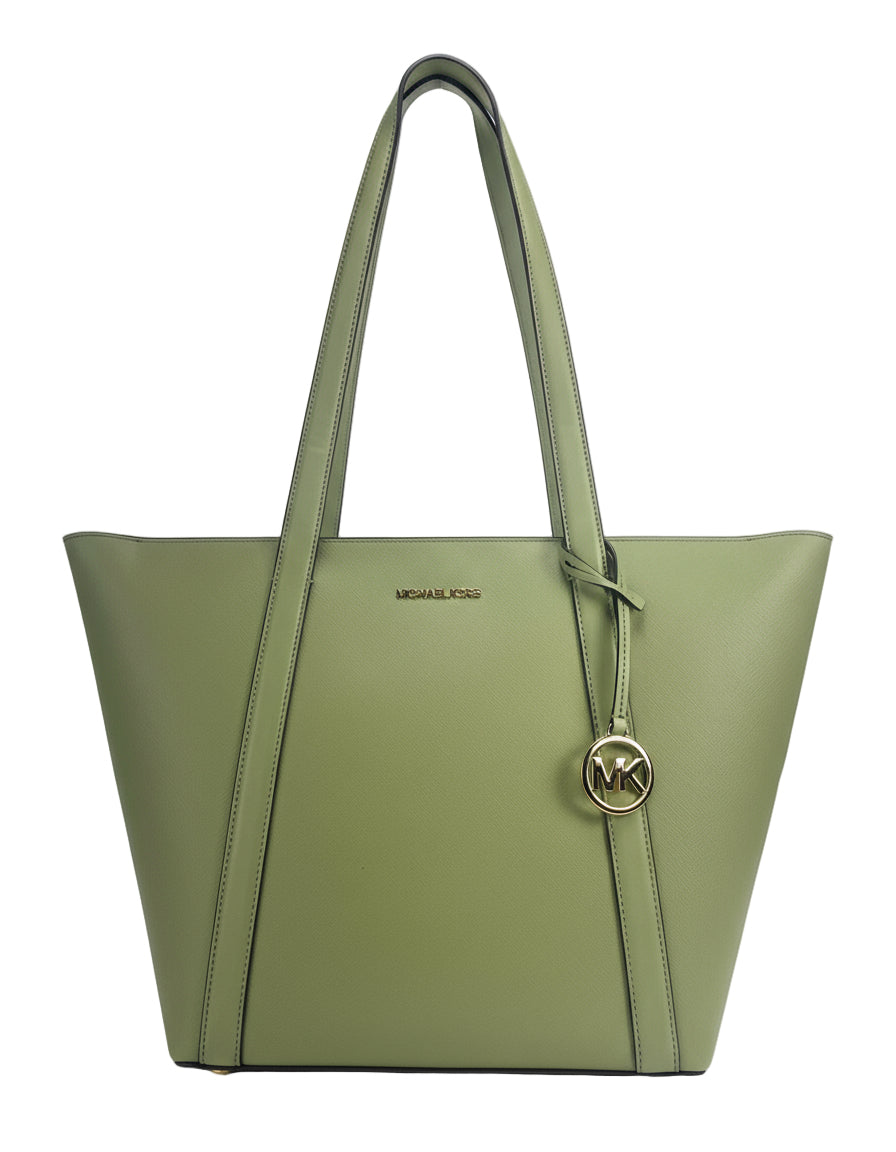Green handbag with a visible brand logo on a white background