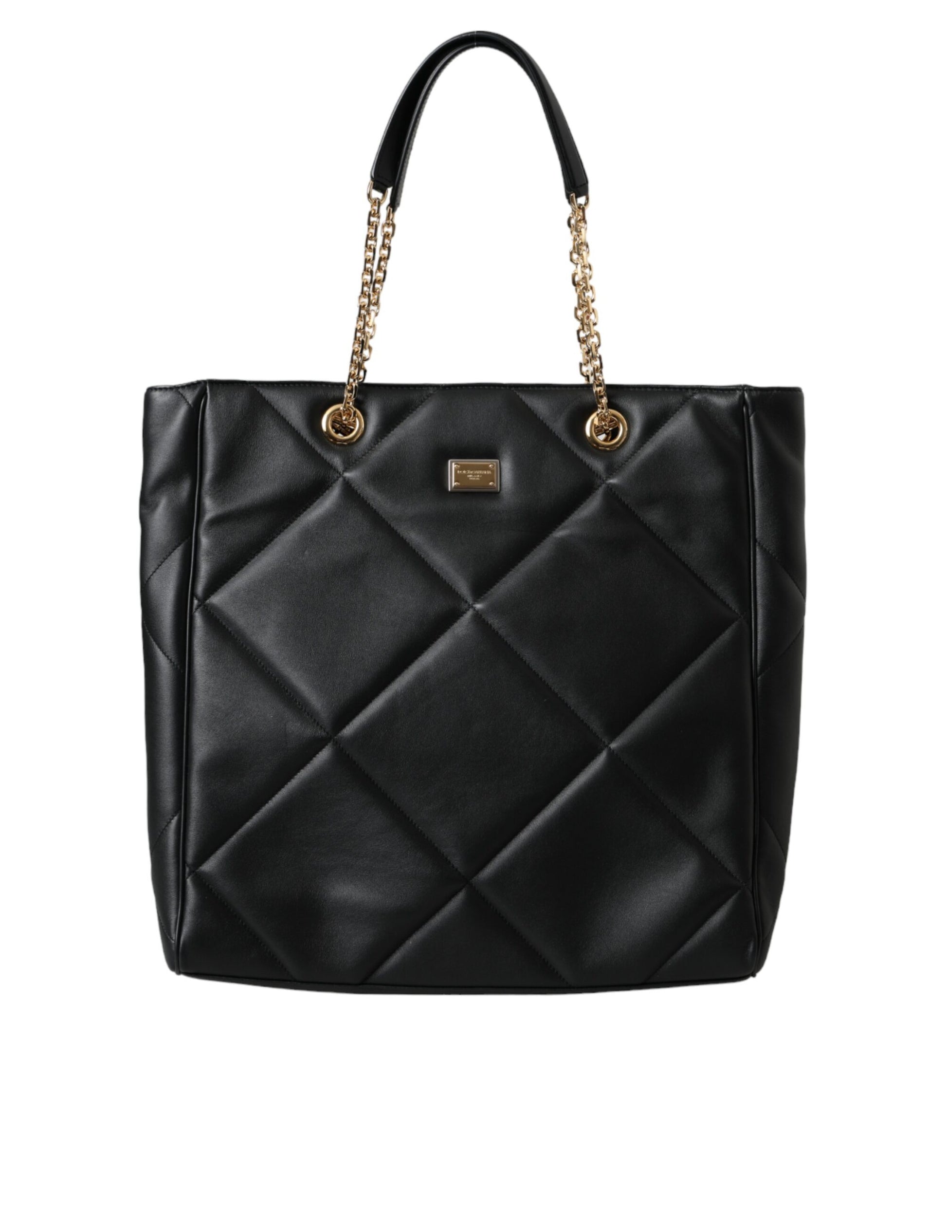 Black quilted handbag with gold chain handle on a white background