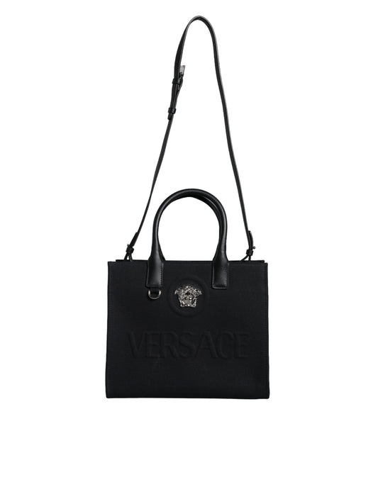 Black Versace handbag with logo on a white background