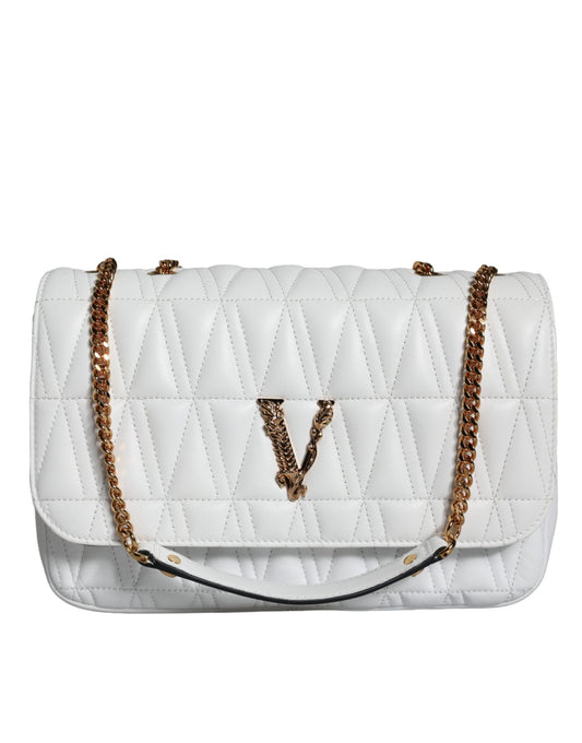 White quilted handbag with gold chain strap on a white background