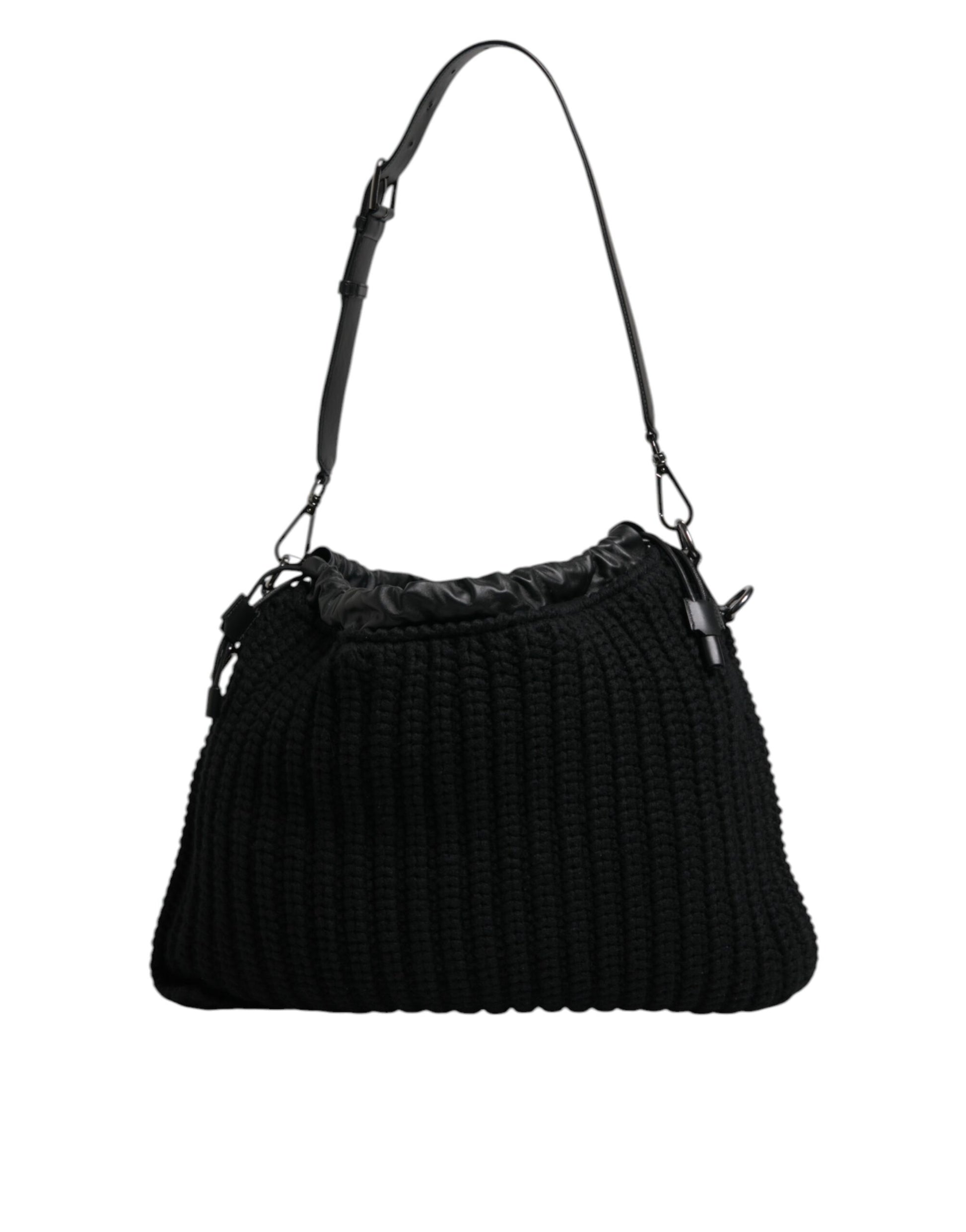 Black ribbed handbag on a white background