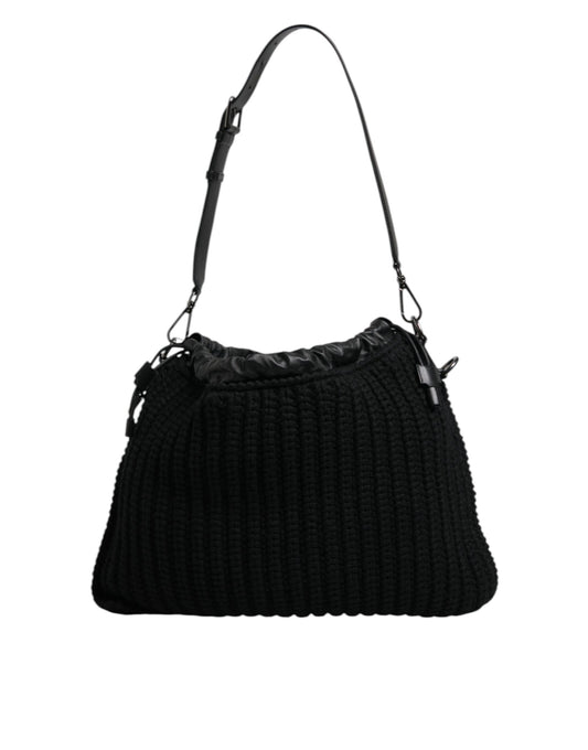 Black ribbed handbag on a white background