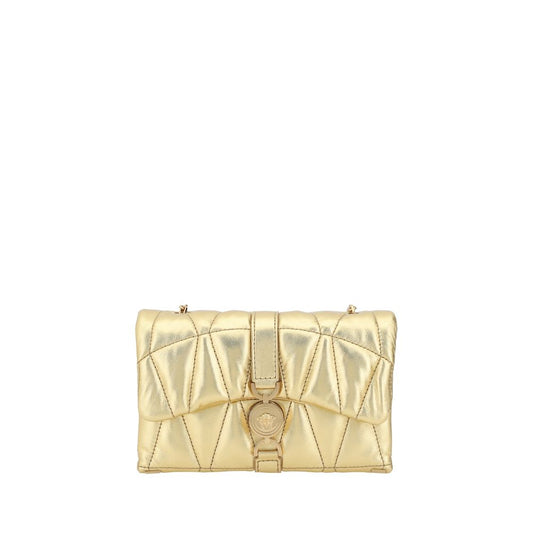 Gold quilted handbag on a white background