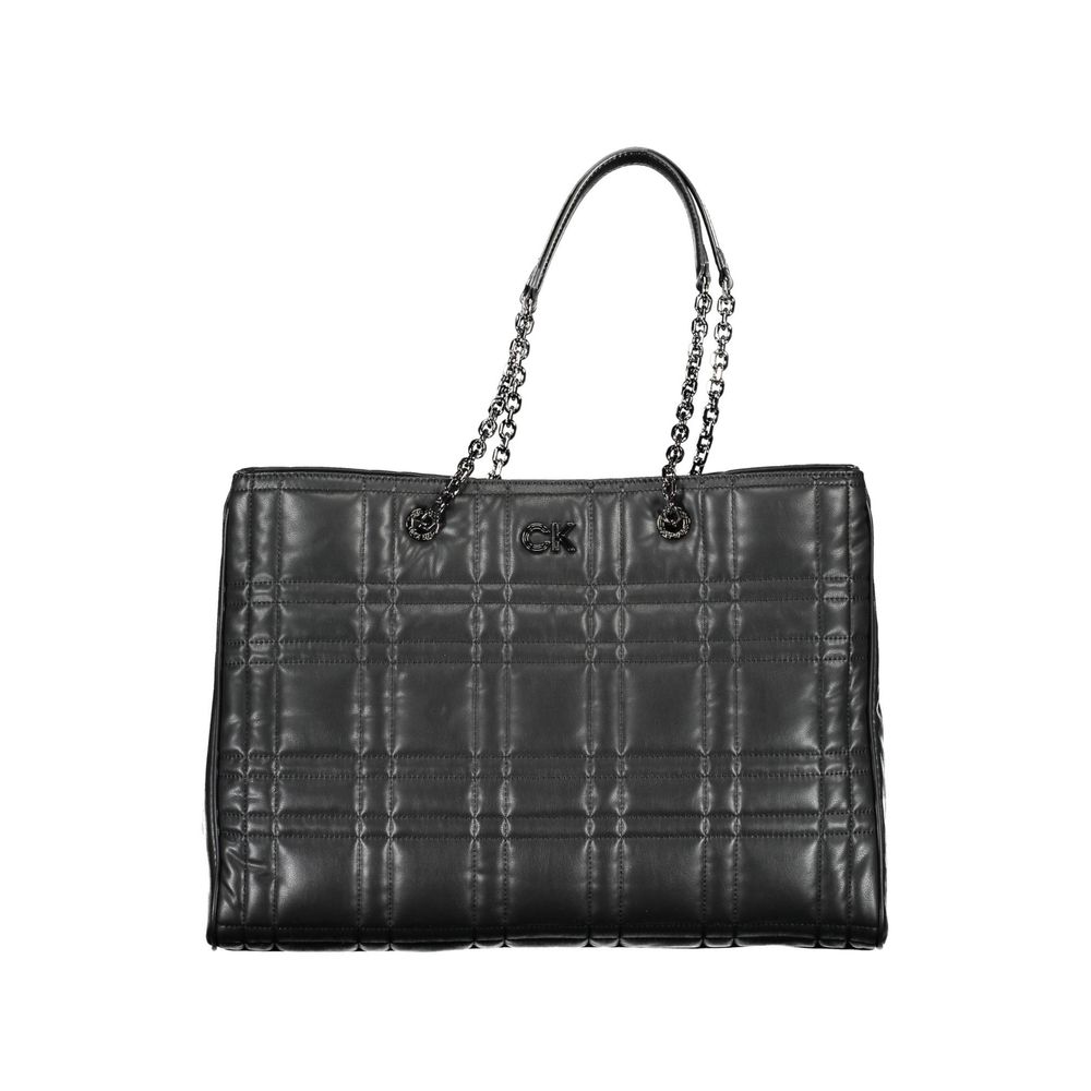 Black quilted handbag with chain detail on a white background