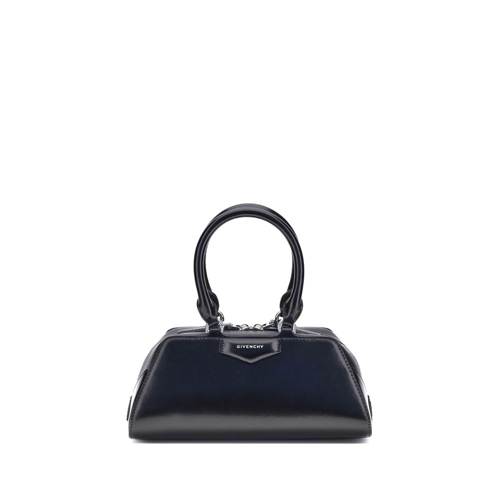 Black handbag with Givenchy logo on a white background