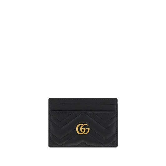 Black quilted cardholder with gold logo on a white background