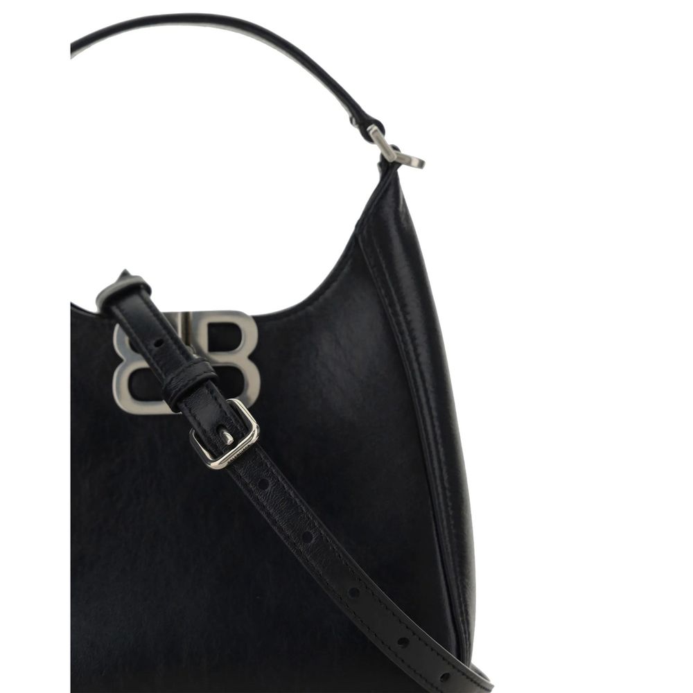 Black handbag with a visible brand logo on a white background