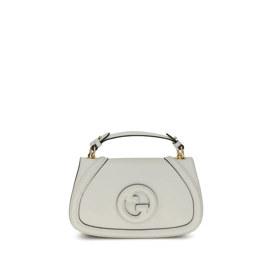 White handbag with a brand logo on a white background
