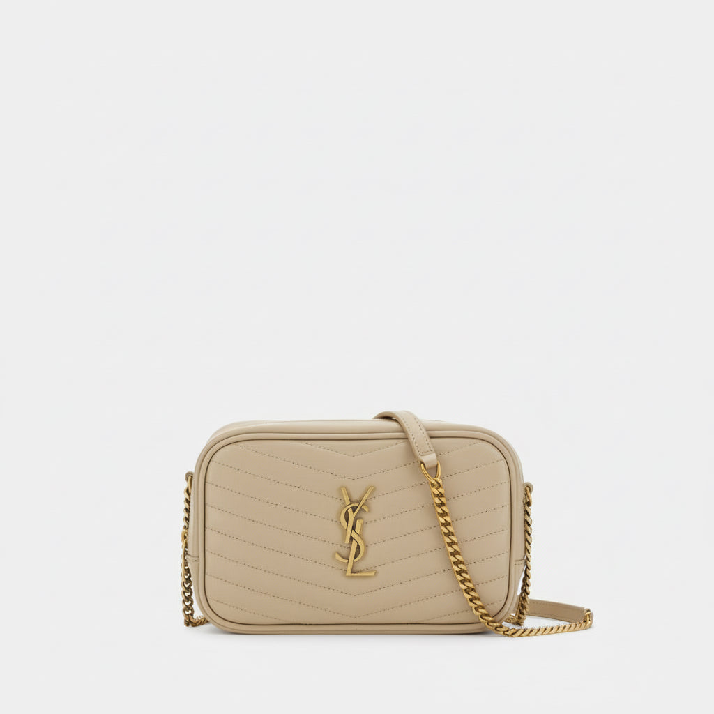 Beige handbag with gold chain and logo on a white background