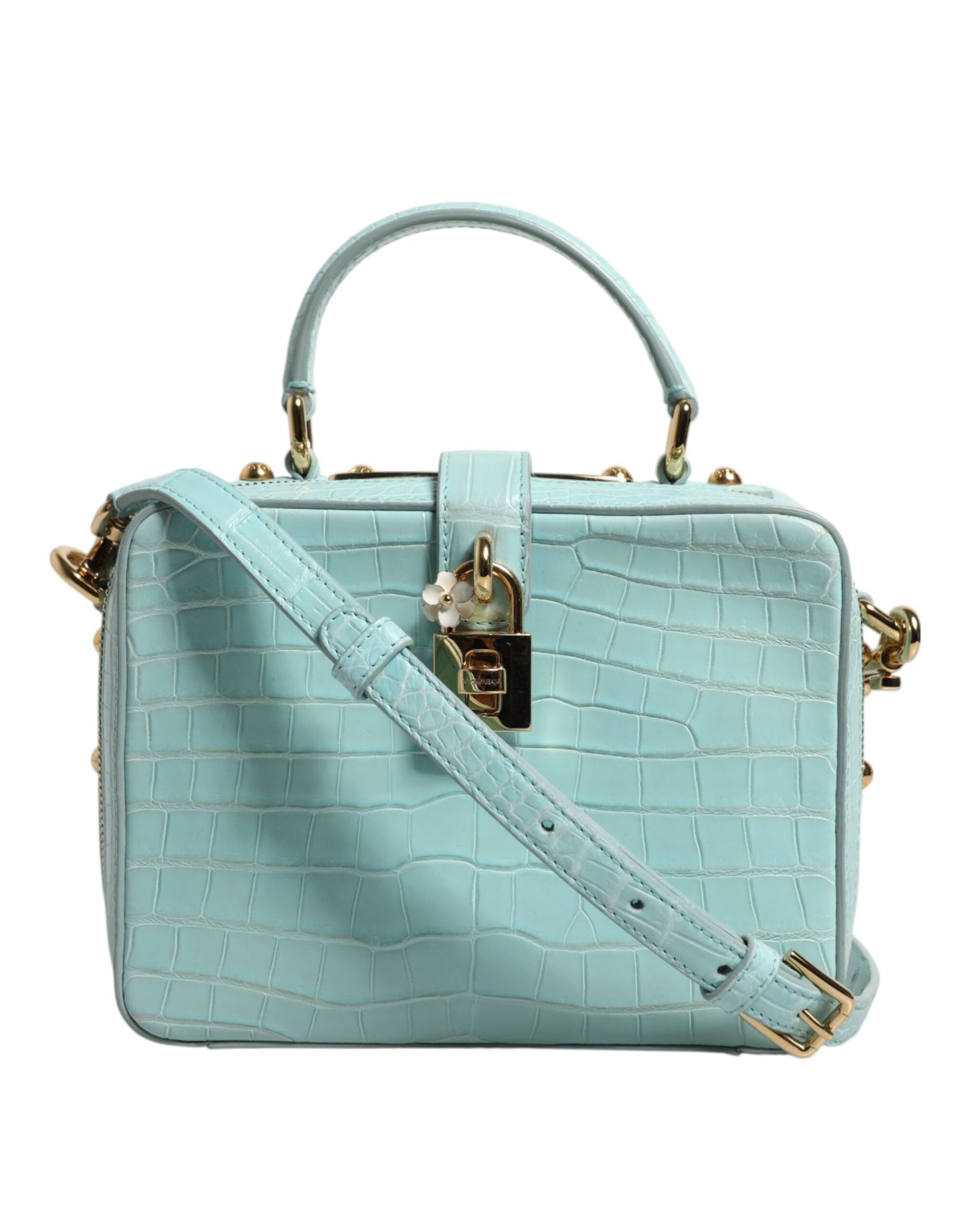 Light blue handbag with gold accents on a white background