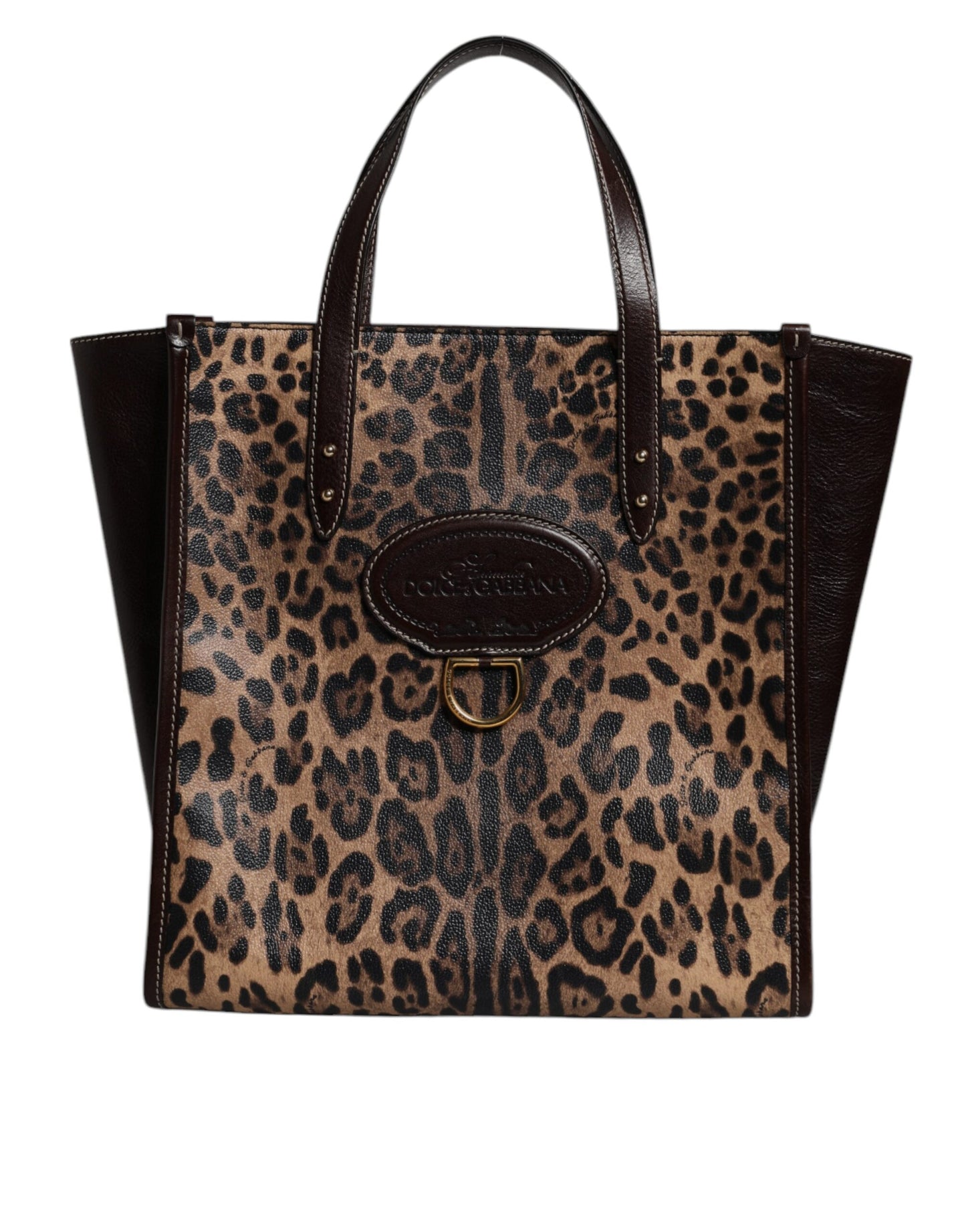 Leopard print handbag with black accents on a white background