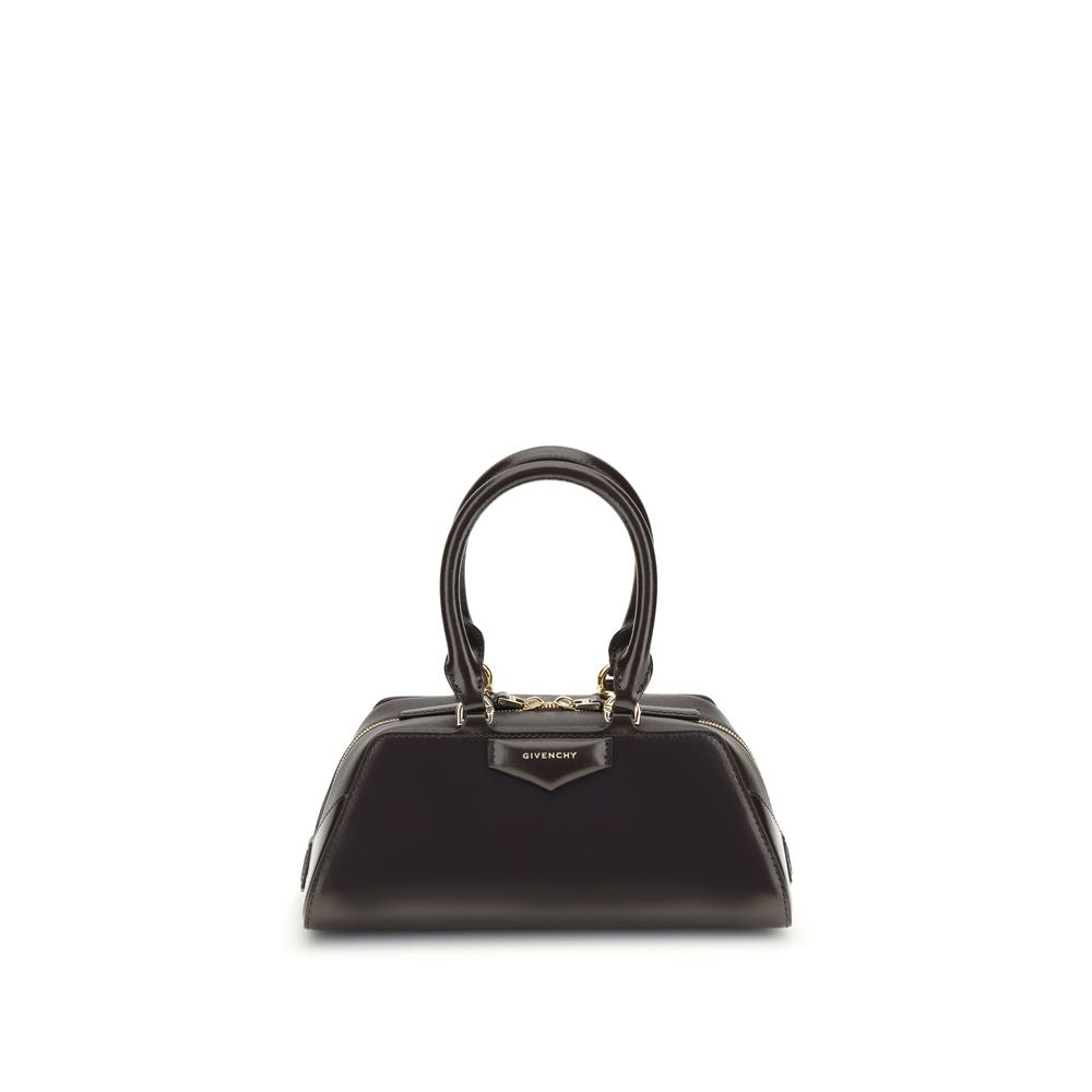 Black handbag with Givenchy logo on a white background