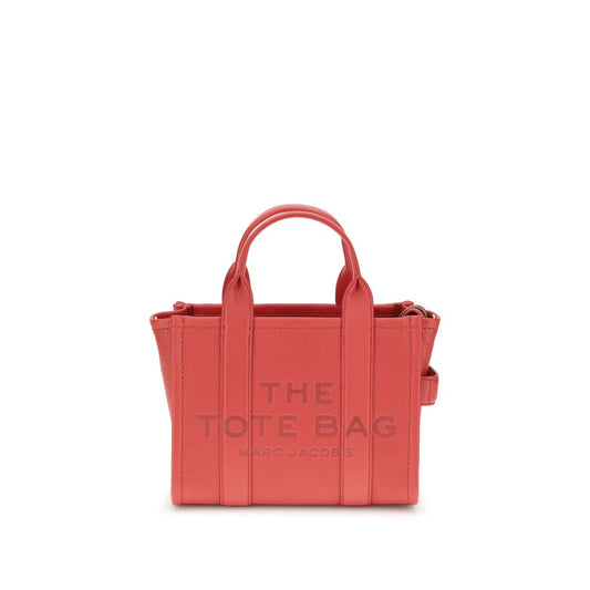 Red tote bag with 'The Tote Bag' and 'Marc Jacobs' text on a white background