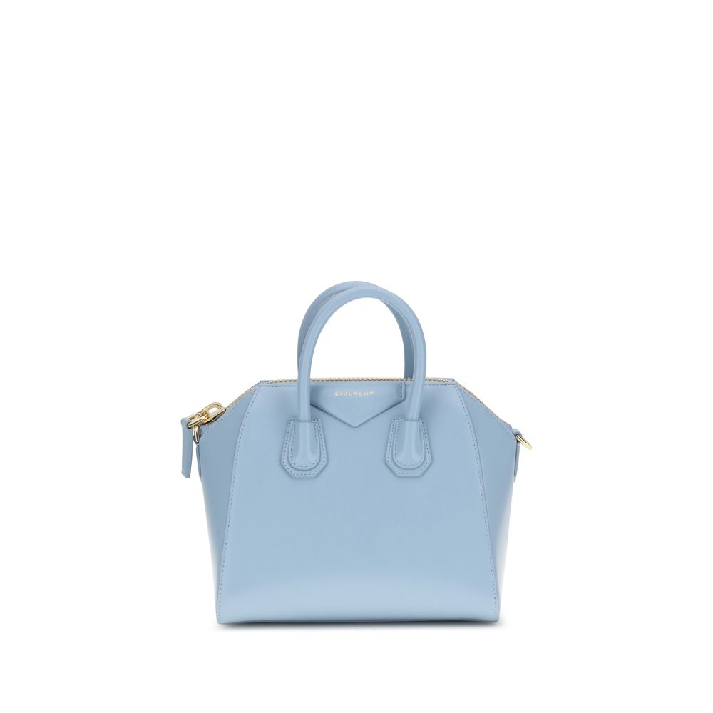 Light blue handbag on a white background