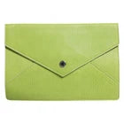 Green clutch bag with a black button on a white background