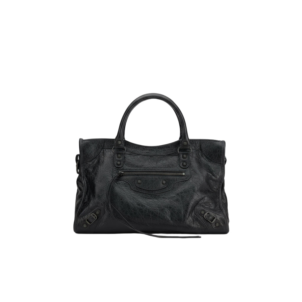 Black handbag on a white background