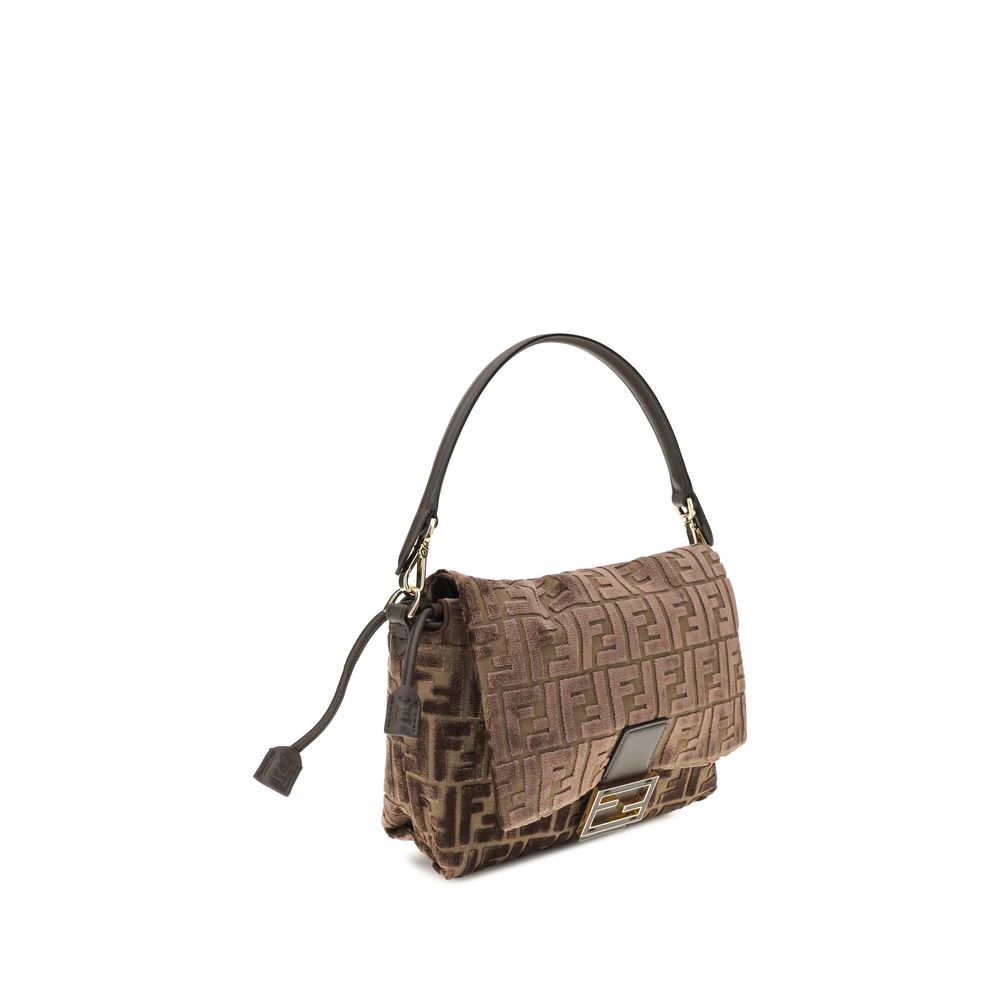Brown patterned handbag on a white background