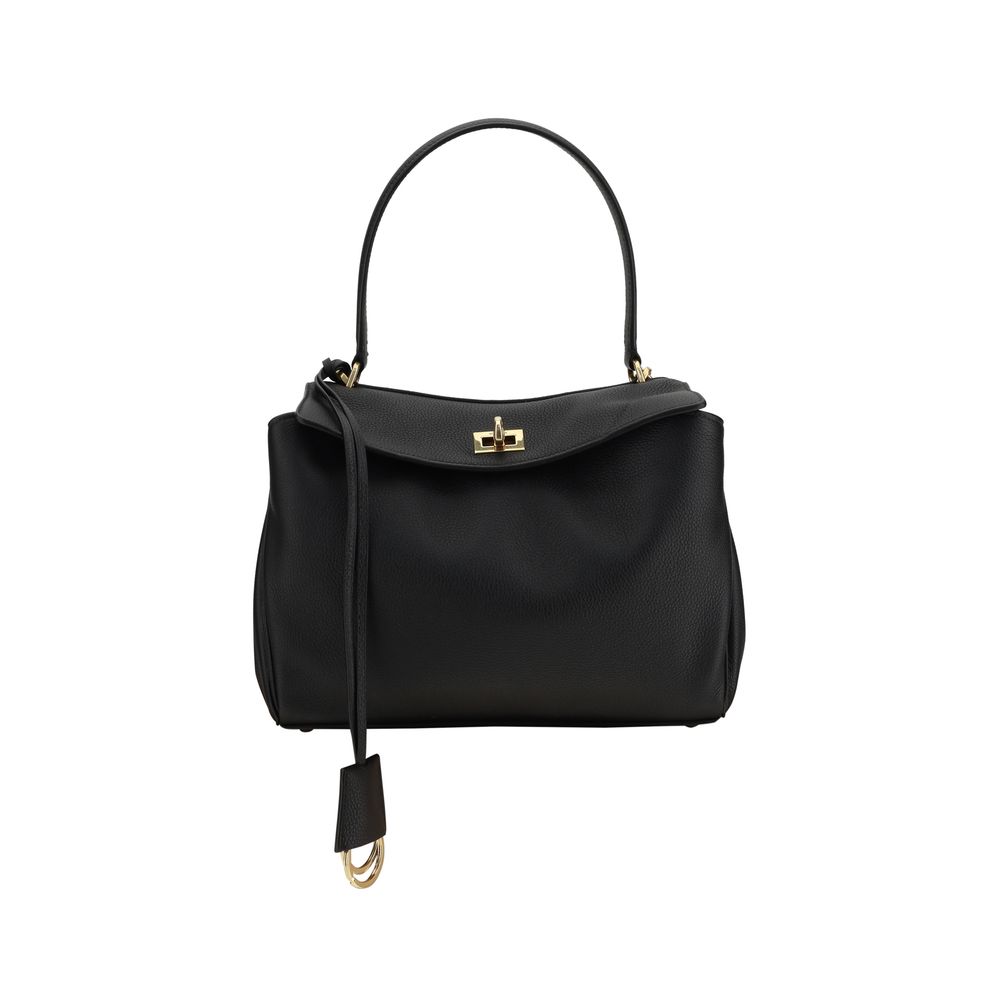 Black handbag with a strap on a white background