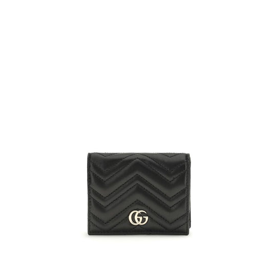 Black quilted wallet with a gold logo on a white background