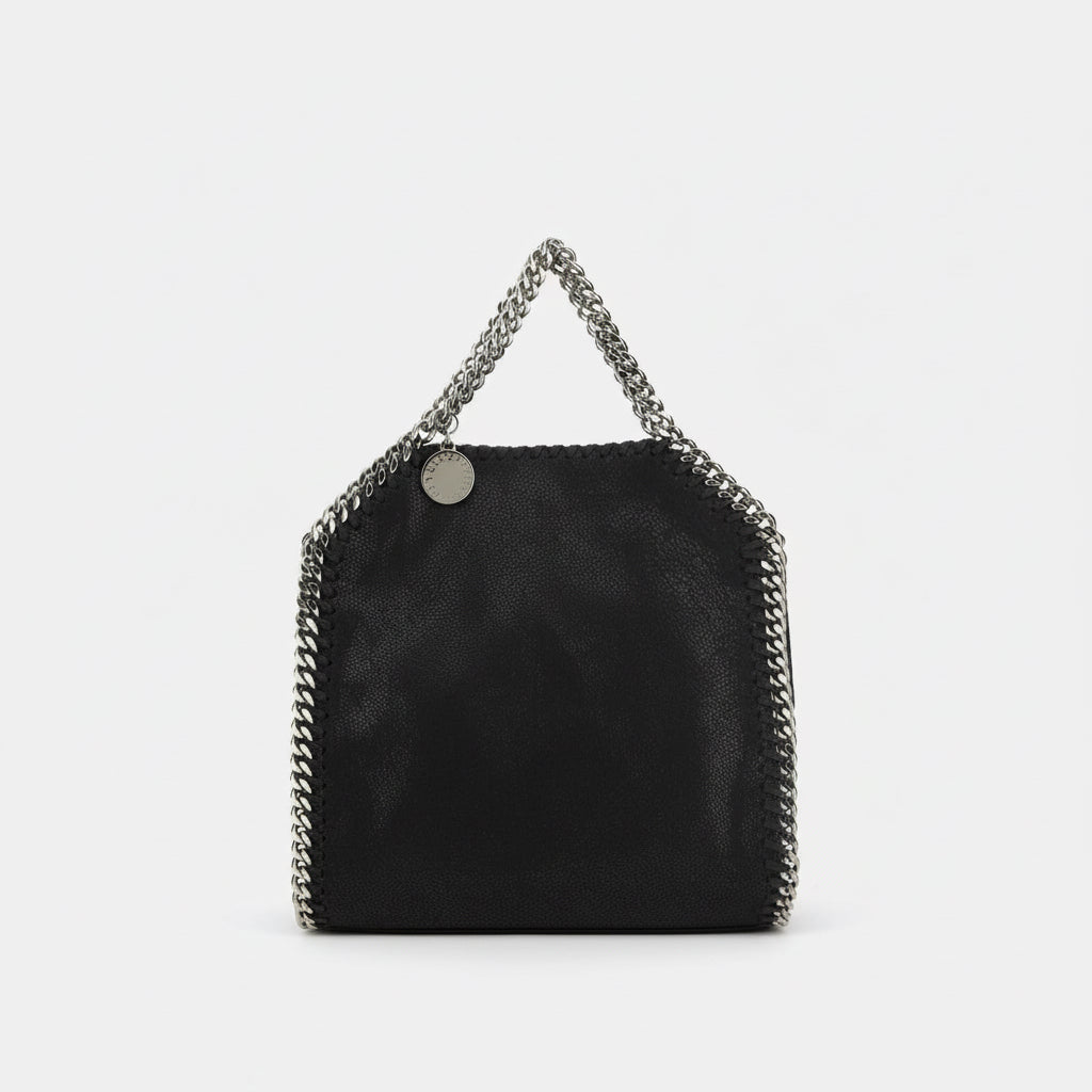 Black handbag with chain detail on a white background