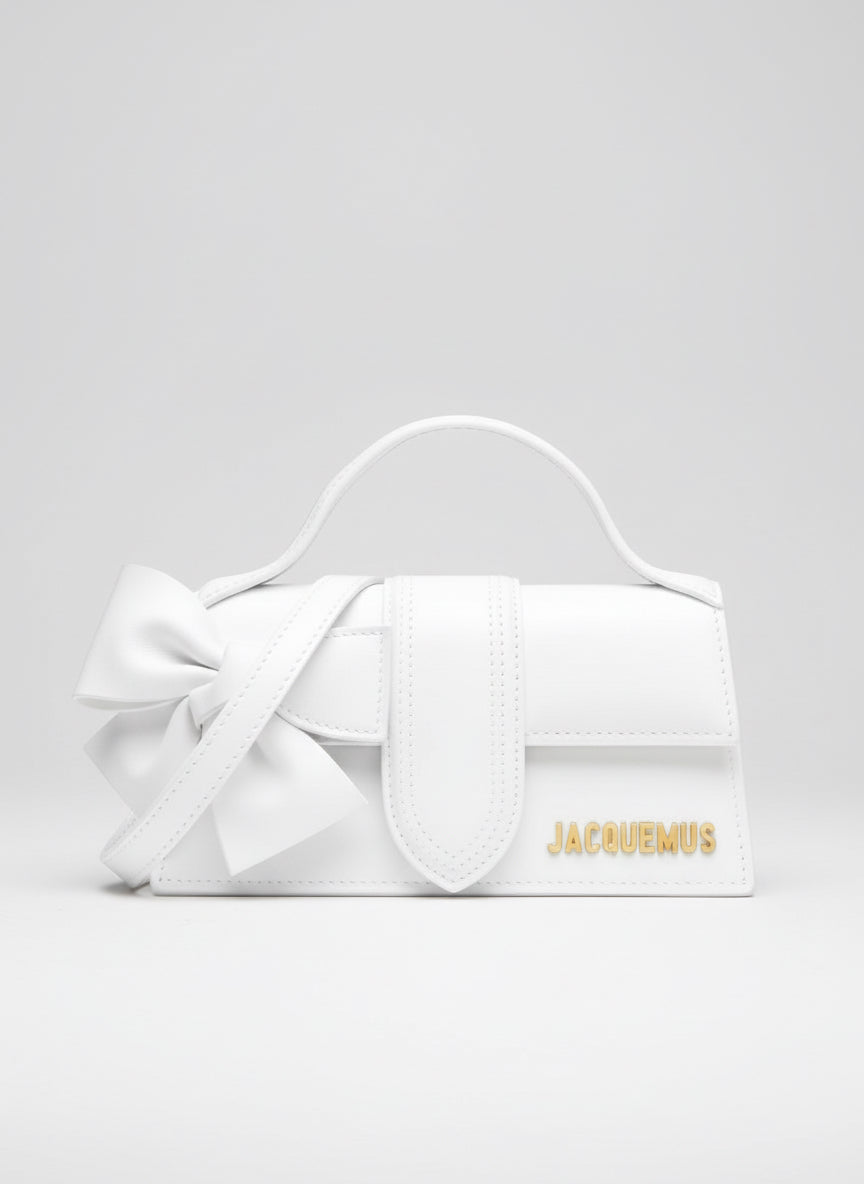 White handbag with 'Jacquemus' branding on a white background