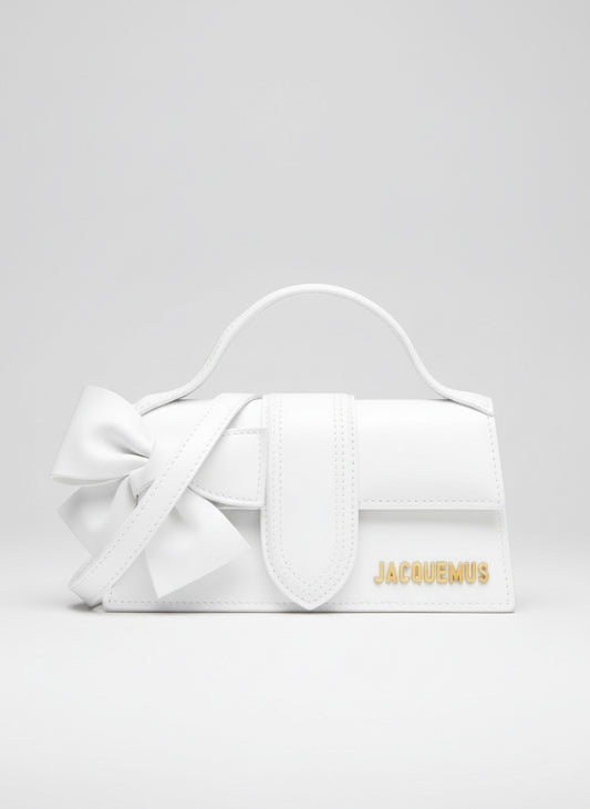 White handbag with 'Jacquemus' branding on a white background