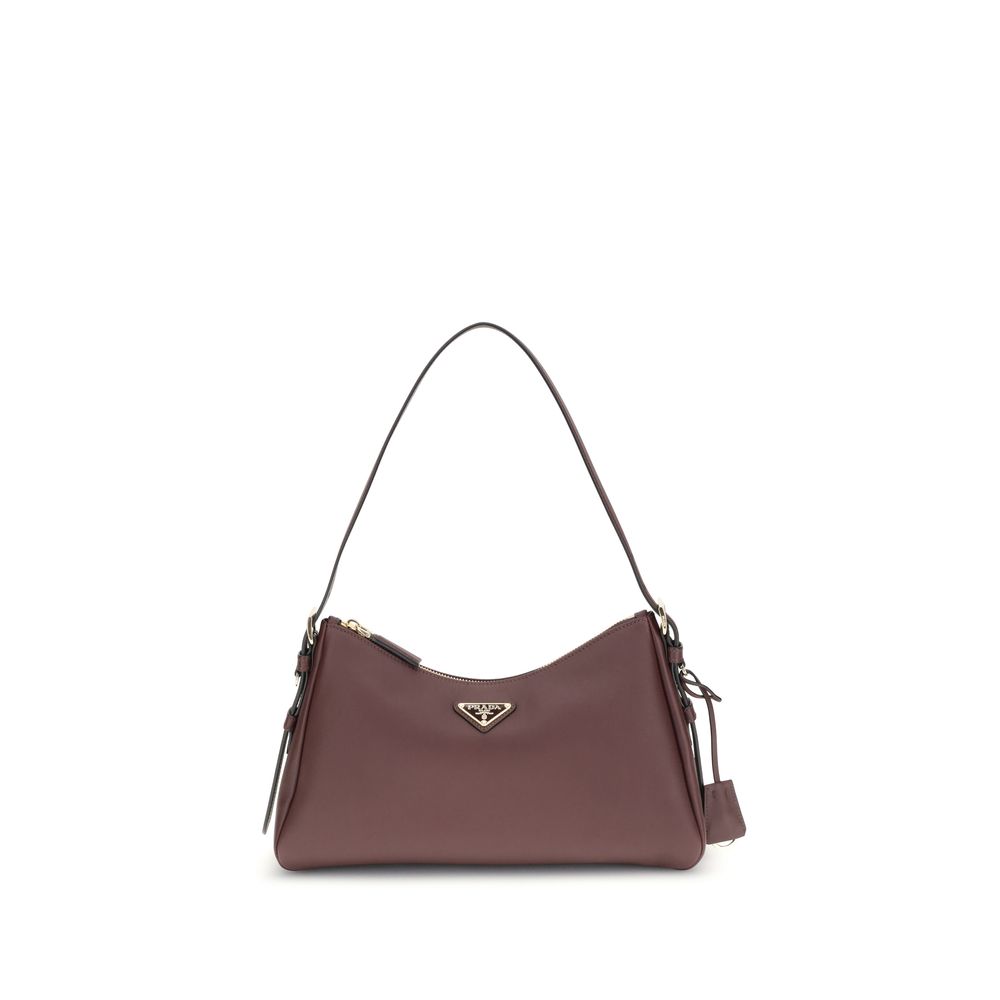 Brown handbag with a brand logo on a white background